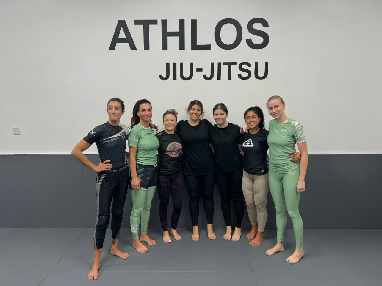 Students practicing Brazilian Jiu-Jitsu